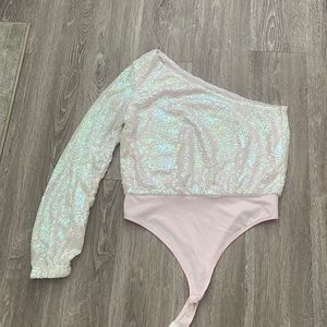 Sparkly one shoulder body suit